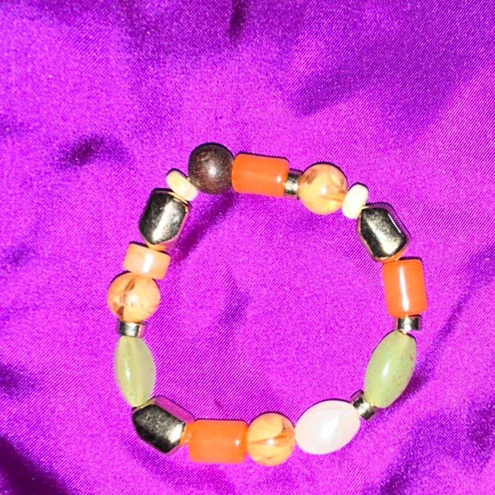 Orange toned multi beaded bracelet